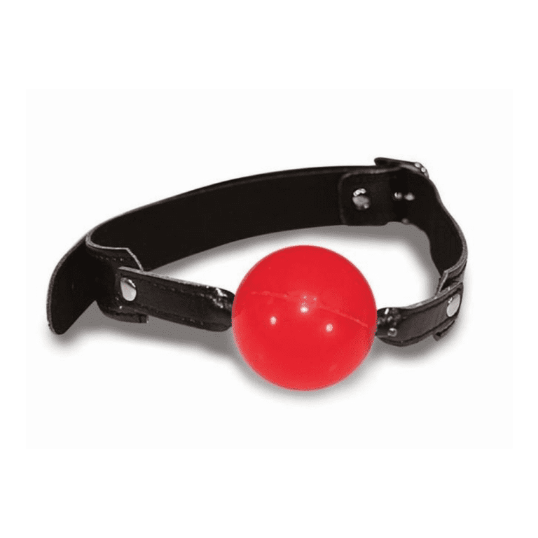 a ball gag with a red ball and black faux leather strap against a white background