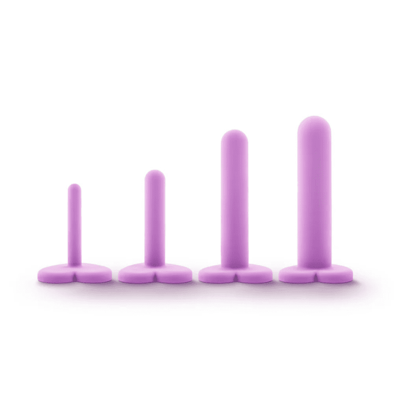 4 purple dilators of different sizes lined up with heart shaped bases against a white background
