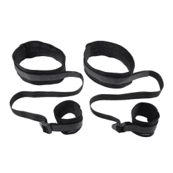 a set of thigh and wrist cuffs against a white background