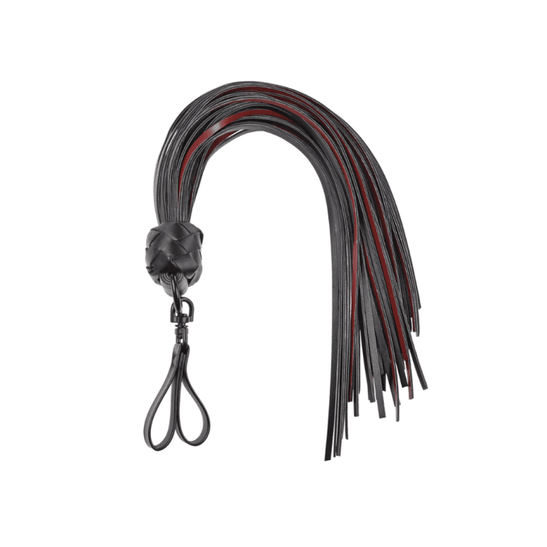 a black and red faux leather flogger with two finger loops against a white background
