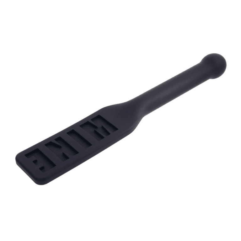 black impact paddle with the words mine backward against a white background