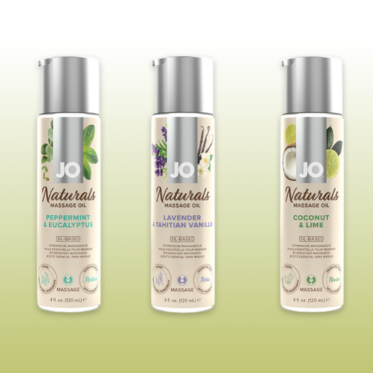 3 bottles of system jo naturals massage oil in three different scents 