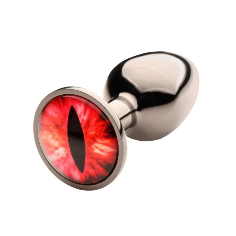 silver metal butt plug with red cat eye glass gem on white background
