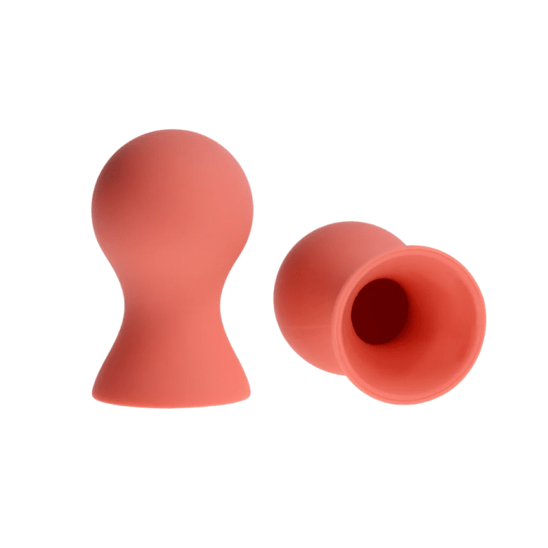 set of peach colored silicone nipple suckers